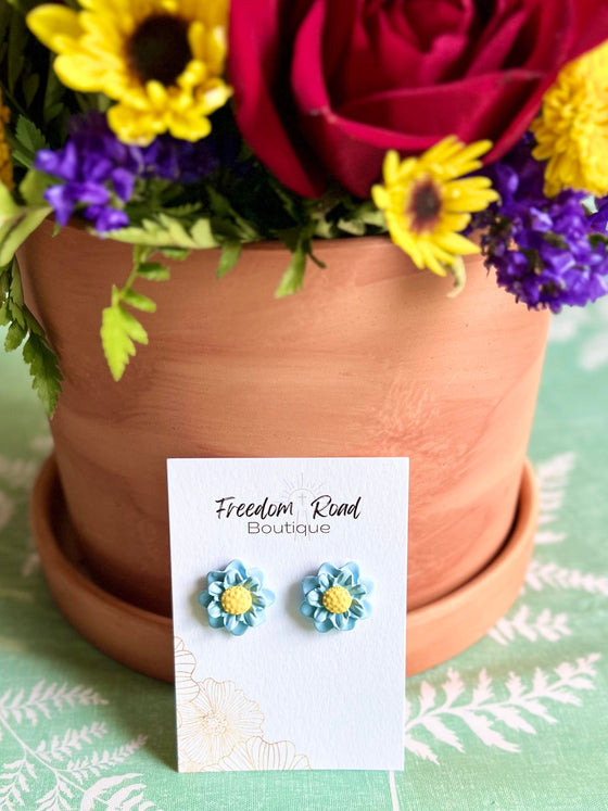 BABY BLUE FLOWER CLAY STUDS