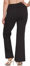 Black pants worn by a person on a white background